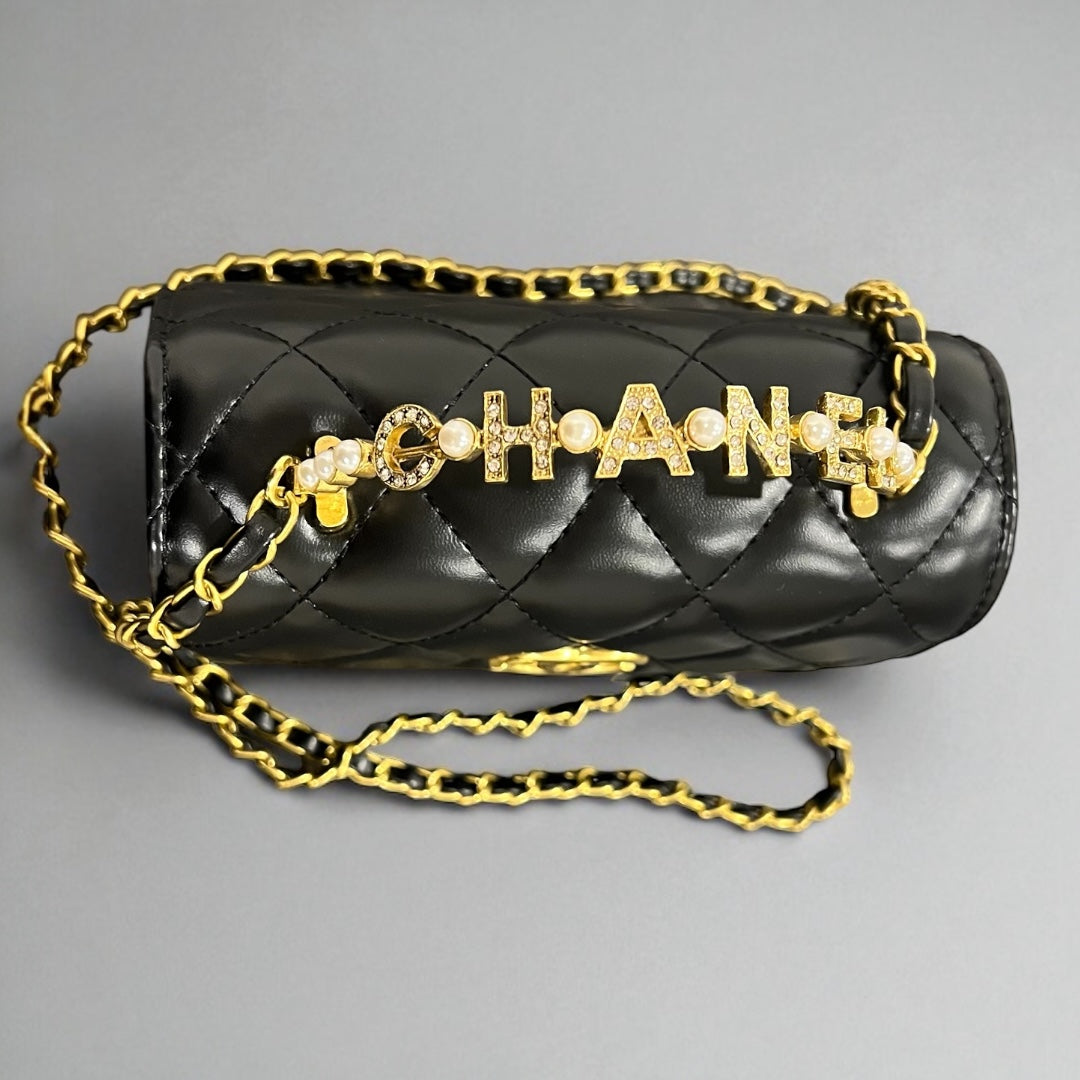 Exclusive Chanel Black Quilted Lambskin Bag with Gold Handle & Crystal Strap