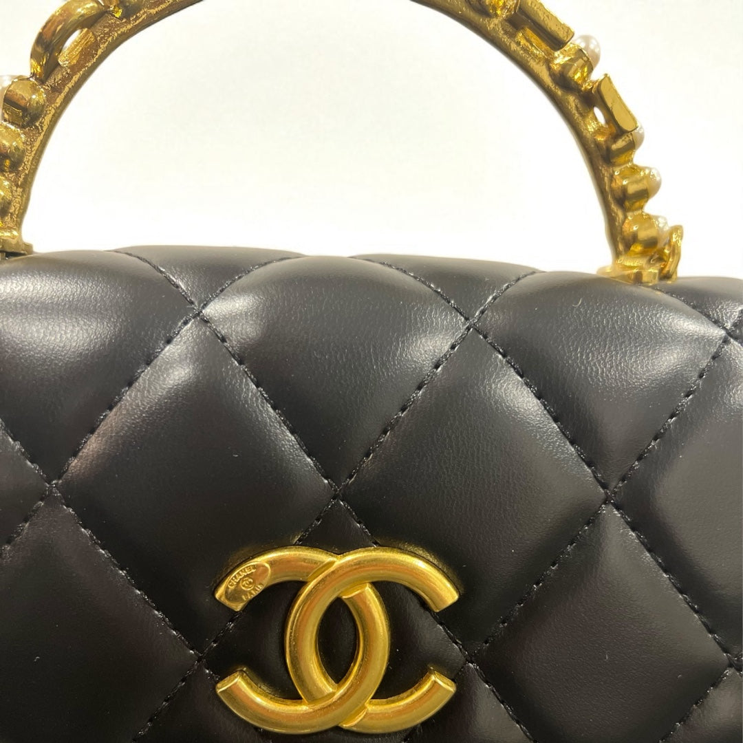 Exclusive Chanel Black Quilted Lambskin Bag with Gold Handle & Crystal Strap