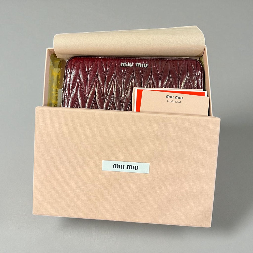 Vintage Miu Miu Matelassé Leather Zip-Around Wallet – Bordeaux Red (2010s)