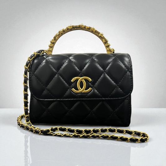 Exclusive Chanel Black Quilted Lambskin Bag with Gold Handle & Crystal Strap