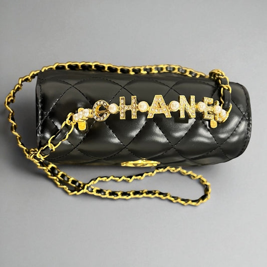 Exclusive Chanel Black Quilted Lambskin Bag with Gold Handle & Crystal Strap